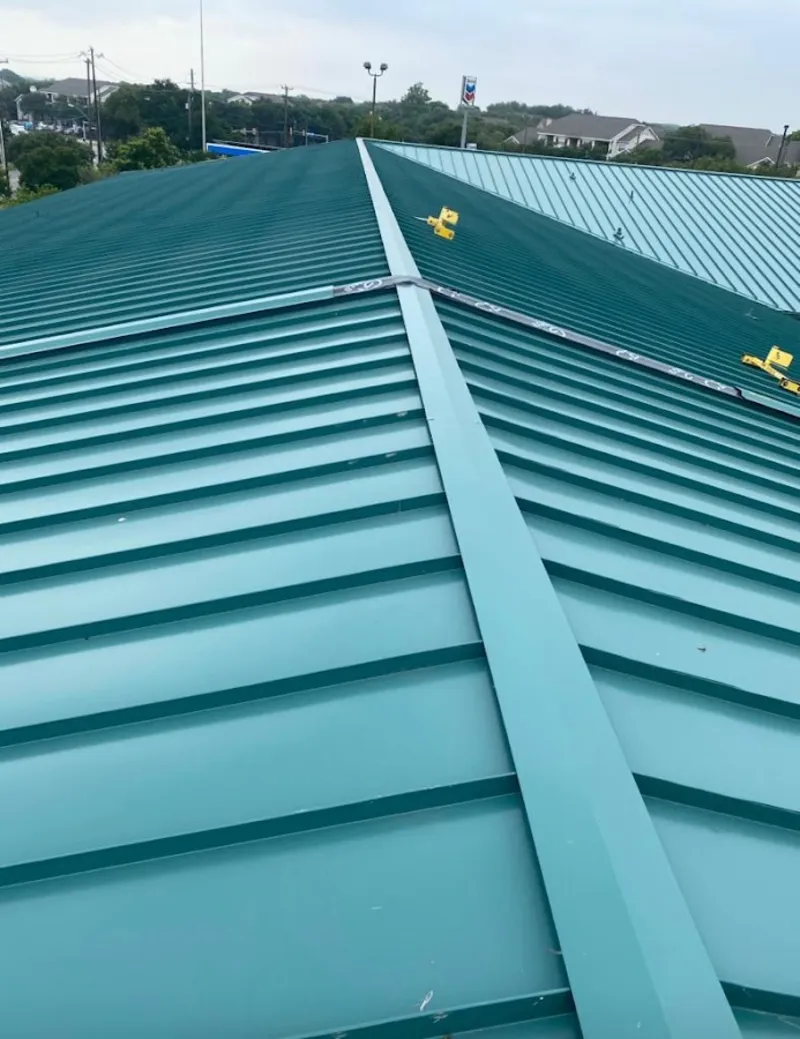 Green commercial metal roof ridge and valley for Metal Roof Repair in Hidalgo